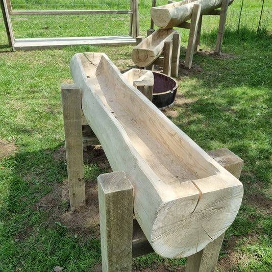 Waterbaan van boomstammen